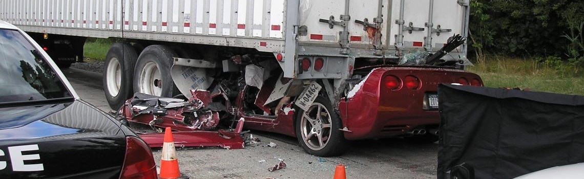 A sports car that crashed into an 18 wheeler